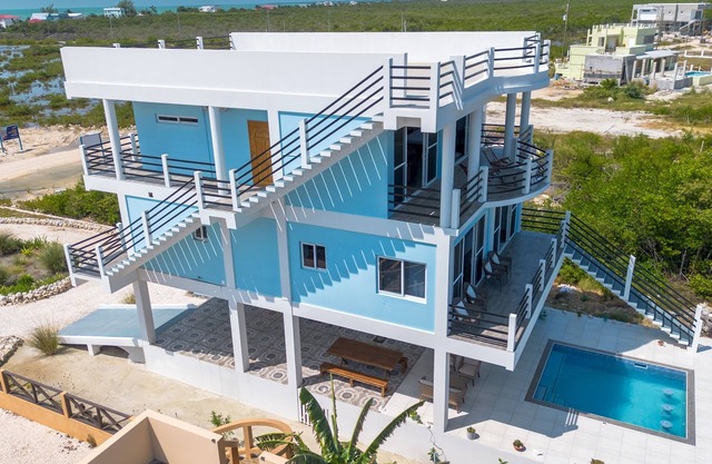 Amazing 2 story oceanfront house with pool, balcony, central AC, & W/D
