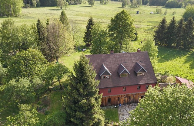 An old, characterful, stone house at the foot of Izery Mountains