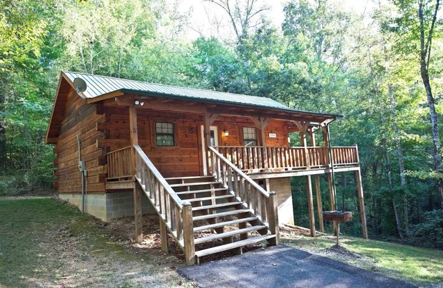 Angler cabin. This modern private studio Cabin with HOT TUB is tucked away in a wooded cove.