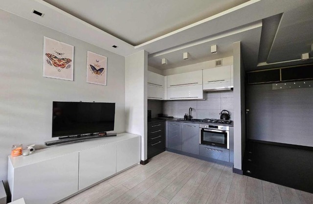 Apartament w centrum miasta z balkonem