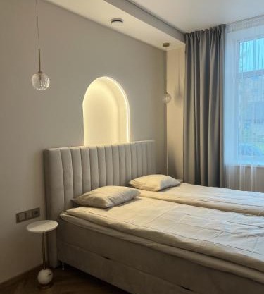 Apartamentai pirmame aukšte, miesto centre