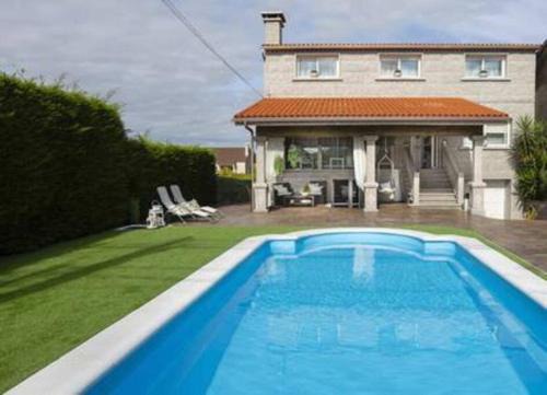 Apartamento con Piscina Ribadumia
