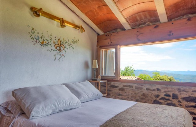 Apartamento duplex rural con chimenea y vistas panorámicas desde la cama