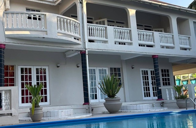 Aparthotel 5-minutes away from beach w/AC, Wi-Fi, & pool view in RodneyBay
