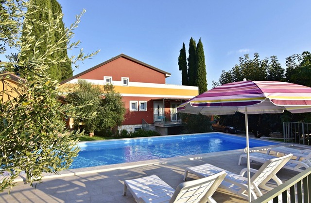 Apartment in the villa in Salvore, with swimming pool, spacious terrace, barbecue