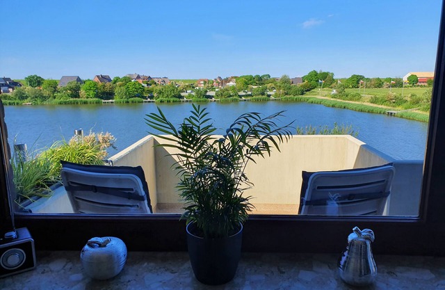 Apartment 'Watt'n Utsicht' with Sea View, Balcony and Wi-Fi