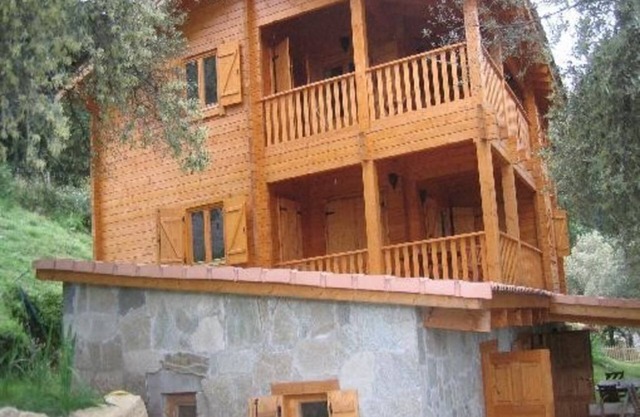 Apartment with balcony and pool in a superb stone and wood chalet