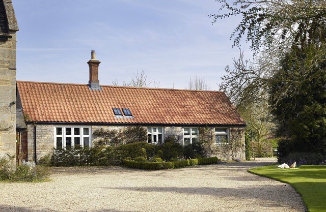 As featured in 25 Beautiful Homes, the Manor Stables offers 4*comfort and luxury