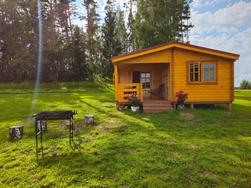Atpūta Priedītēs - koka namiņi pie Tērvetes Dabas parka ar zirgiem, ponijiem un dabas tuvumu