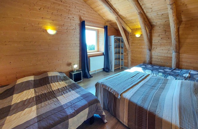 Attractive vacation home made of wood and stone with space for the whole family.