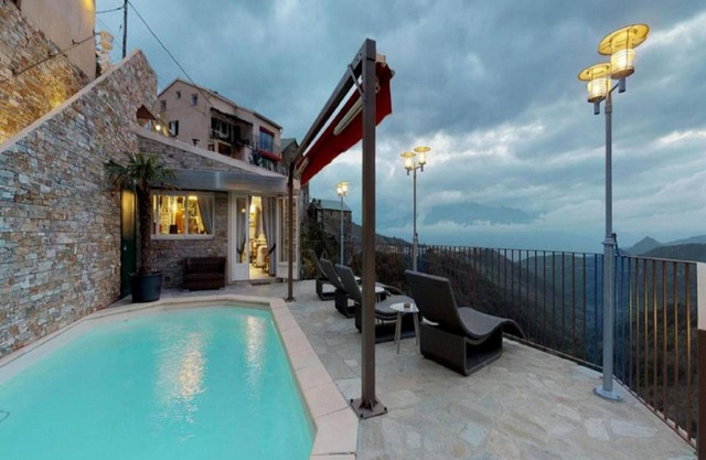 Attractive holiday home in Mazzola with sauna