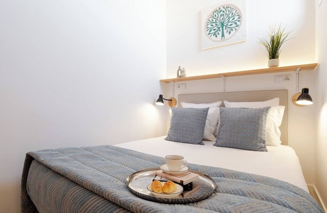 Authentic Studio 3 with Terrace by HostWise