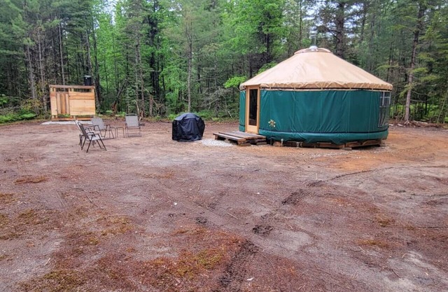 Ava Jade yurt nestled in the woods of Brownfield, Maine