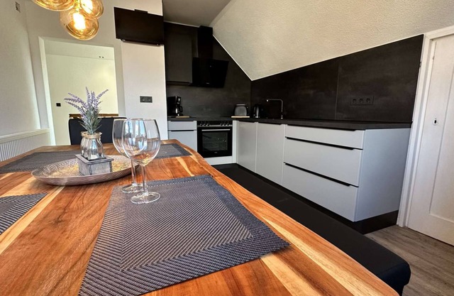 B&W Apartments - DG Wohnung