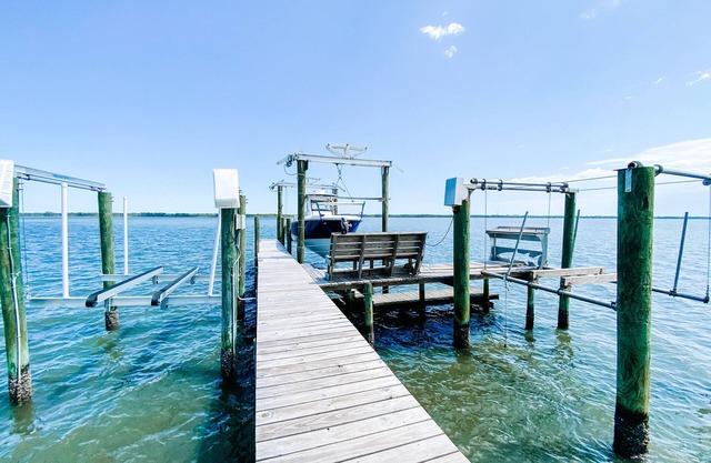BEACH FRONT to BAY with boatdock, swimming pool, pickleball courts and kayaks.