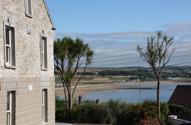 Beach view, period house, contemporary fitout in historic, fishing village
