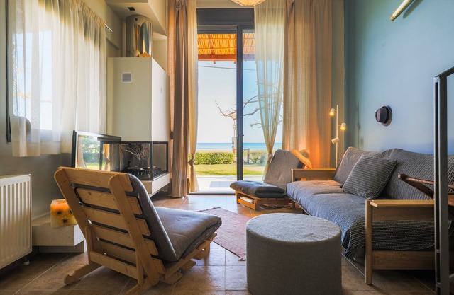 Beachfront Luxury. A Modern Maisonette with Breathtaking Views in Kalamitsi.