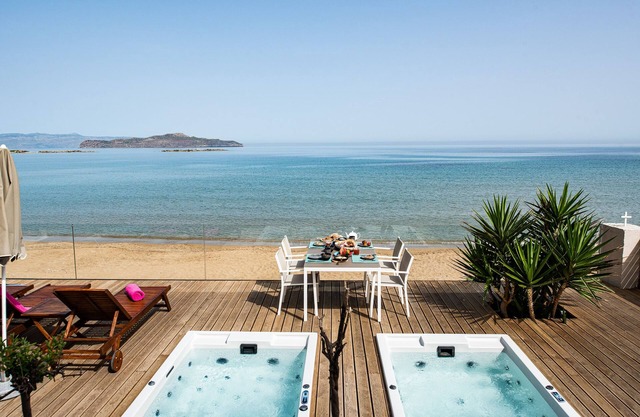 Beachfront luxury villa with hot tub & sunset view