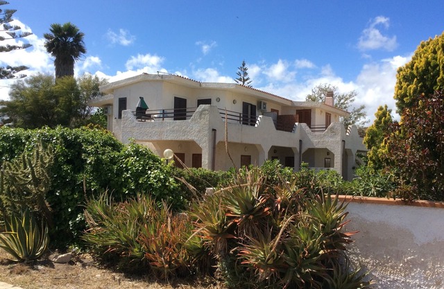 beautiful apartment in villa, private beach with umbrellas and sunbeds