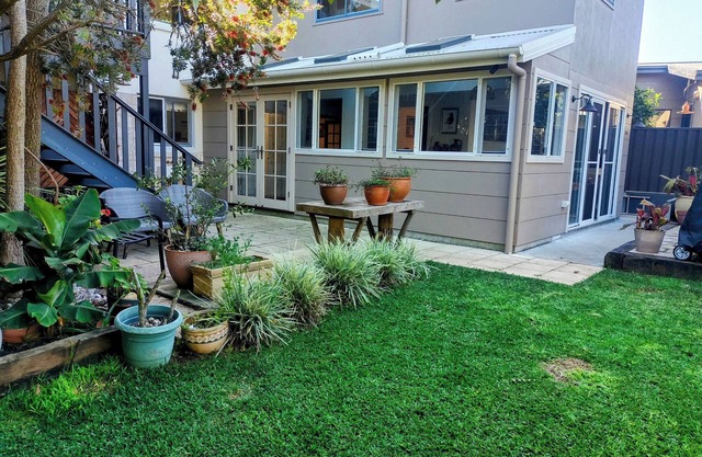 Beautiful eclectic studio with lush private garden and solar heated pool