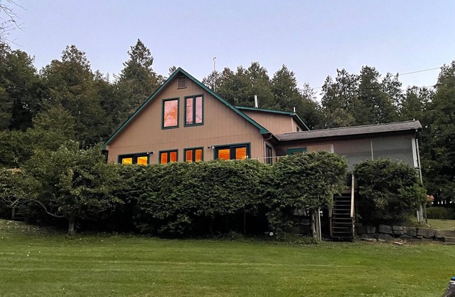 Beautiful lake front home with 200 feet of waterfront