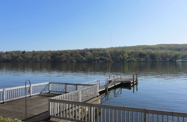 Beautiful lakefront summer house with hot tub and private dock!
