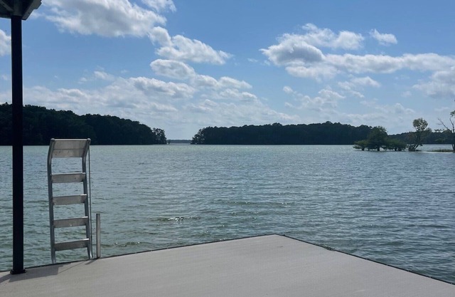 Beautiful luxury lake front home with private dock and outdoor fireplace