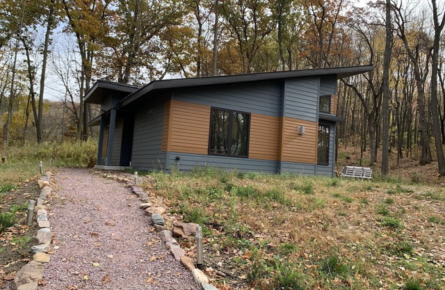 Beautiful new contemporary home, quiet wooded lot minutes from Devils Lake