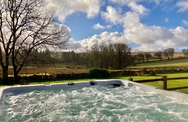 Bespoke country house in the heart of Dartmoor with hot tub and private grounds.