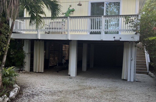 Big Pine Key Paradise Canal front fenced yard.
