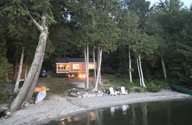 Boating, fishing, and swimming on Green Lake! Your own private beach near Acadia