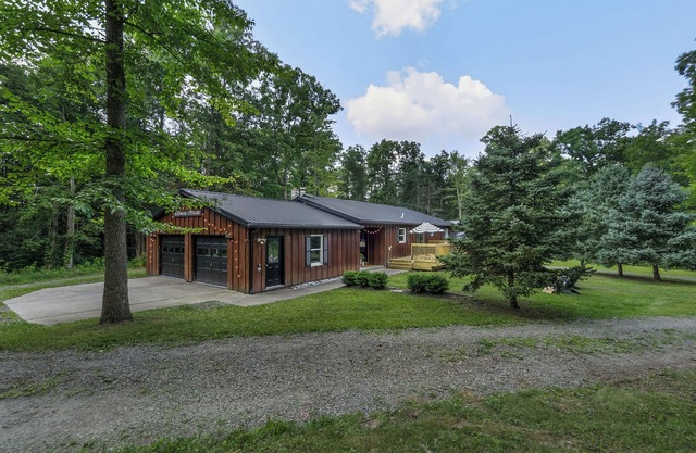 Boxwood Cottage, sleeps 8, nestled in the woods