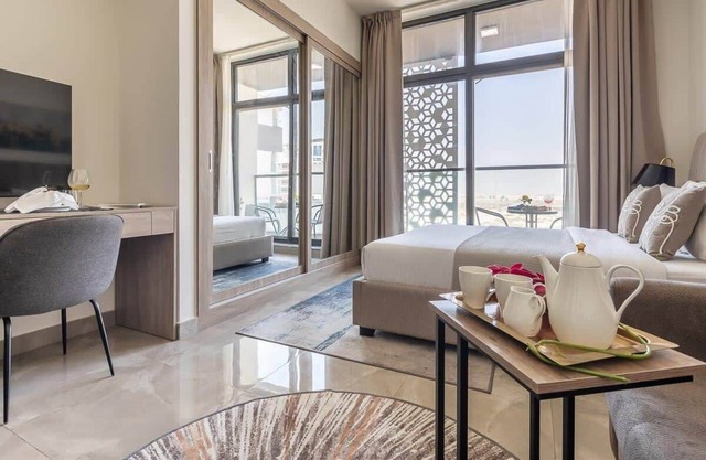Bright and Spacious Studio near DWC Airport!