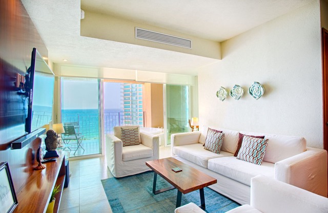 Bright & Breezy Ocean View Condo | Pools, Gym