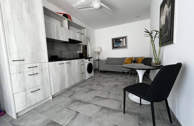Bright modern apartments near the port and the beach