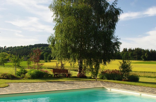 Calm and relaxation in nature . and the pleasure of a heated pool!