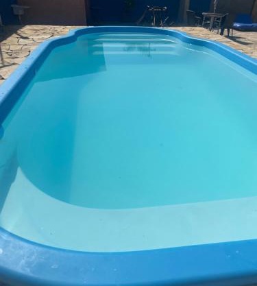Casa ampla a 100 passos do mar, piscina, churrasqueira, salão de jogos