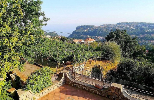 Casa Rosea: A characteristic two-story apartment that is part of a villa built sheer above the valley, with Free WI-FI.