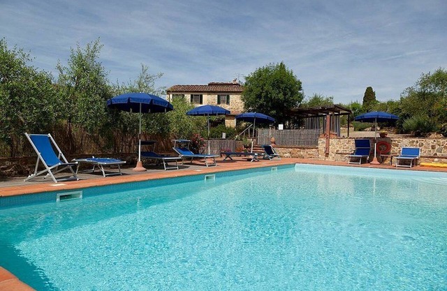 Casa Sparviero A: A characteristic and welcoming two-story apartment that covers the entire top floor of a villa surrounded by meadows and by green hills, with Free WI-FI.