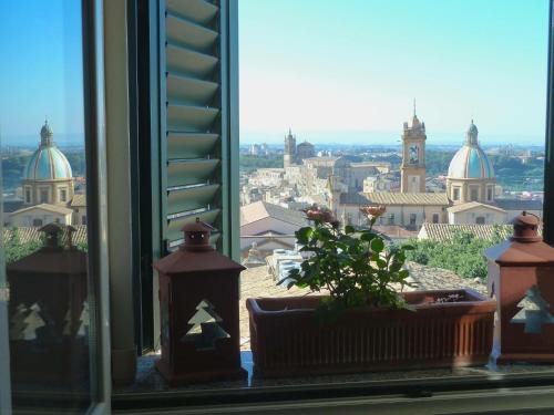 Casa tipica siciliana patronale home BedandBreakfast TreMetriSoprailCielo Camere con vista, colazione interna in terrazzo panoramico