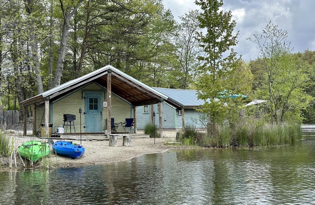 Castaway lake side canvas cottage scene