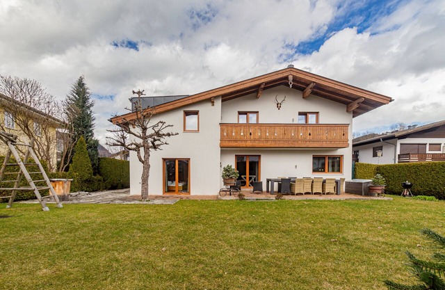 Chalet Hohe Tauern, near the lake, with garden and mountain view