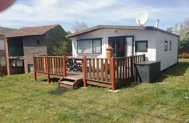 Chalet-style mobile home with 15-square-metre terrace, view of surrounding mountains