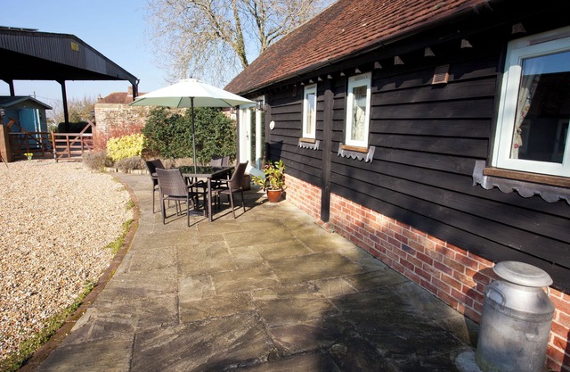 Characterful barn conversion on working farm.