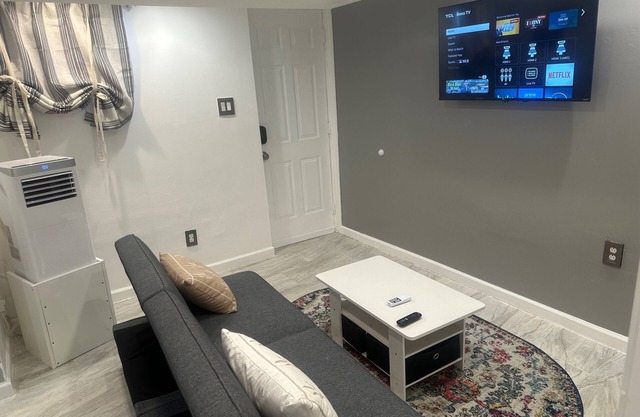 Charming 2-Bedroom Basement Retreat in Uniondale – AC, WiFi & More!