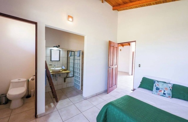 Charming 2-bedroom bungalow in peaceful Guanacaste with AC and Swimming pool.