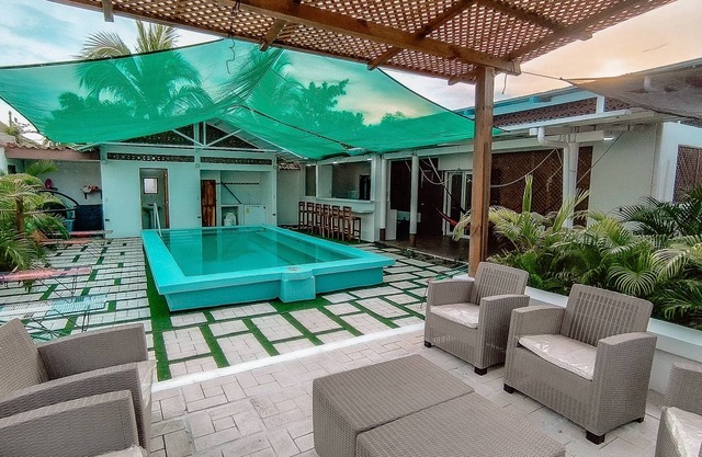 Charming 2-bedroom house with WiFi, Pool, and AC in enchanting Monterrico.