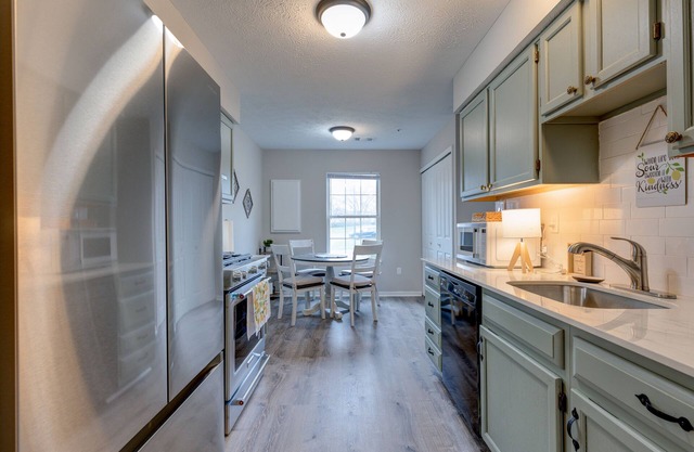 Charming 3-Bed Townhouse with Private Fenced Yard - Your Home Away from Home!