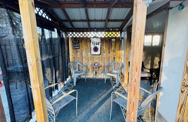 Charming 4-bedroom house with pool and spacious backyard.