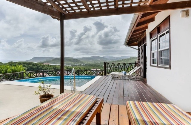 Charming Cottage Located In Cap Estate - Orchid Cottage 1 Bedroom Home by RedAwning